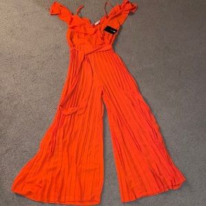Coral off the shoulder flare pant jumpsuit